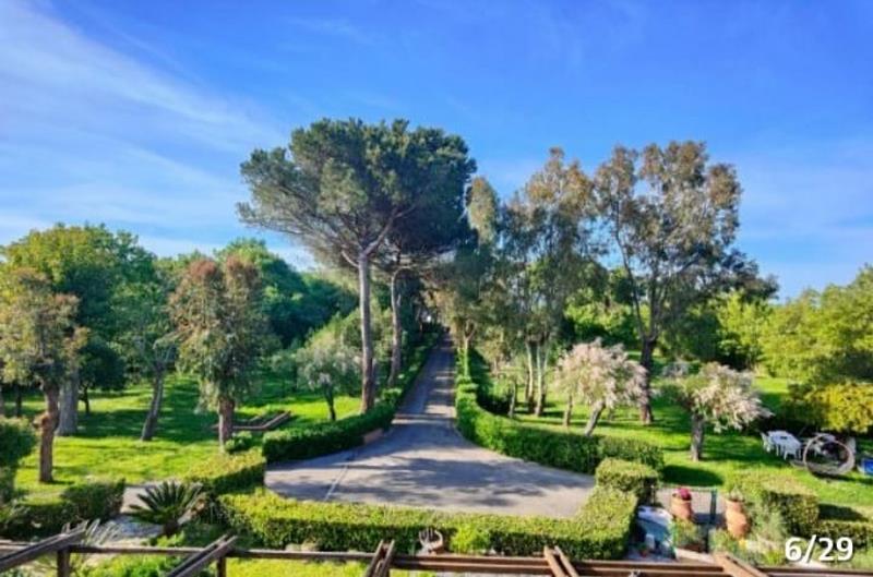 Seafront Estate in Tuscany with Private Mooring & Park – Renovation Opportunity
