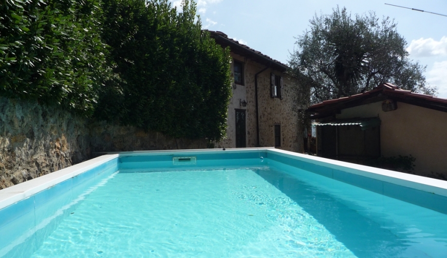 Isolated stone house with guest house above Camaiore